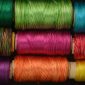 full frame shot colorful spools 85x85